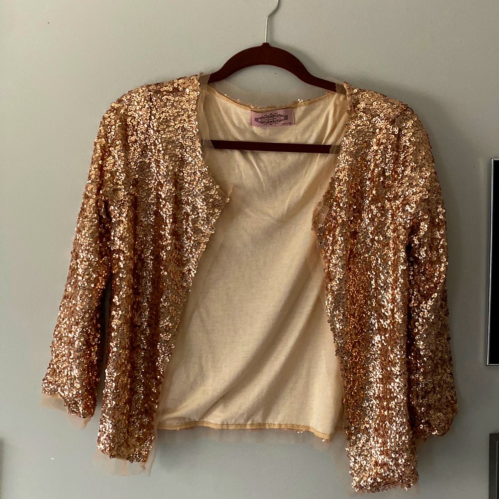 More gold then rose gold, but not that yellowish gold sequin petite cardigan.